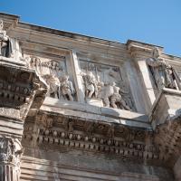 Arch of Constantine - Detail: View of Relief Panels from a monument to Marcus Aurelius depicting a Captured Chieftan before the Emperor and Prisoners before the Emperor with Dacians on top of Columns on either side
