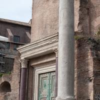 Temple of Romulus - View of the best preserved column in front of the Temple of Romulus and the temple in the background