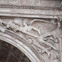 Arch of Septimius Severus - Detail: View of a victory with a trophy on the right Spandrel of the western face of the Arch of Septimius Severus