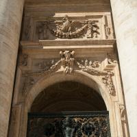 Saint Peter's Square - Exterior: Detail View Sculptural Decoration above a door from Saint Peter's Square