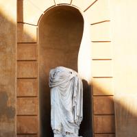 Togate Statue - View of a Headless Togate Statue in the Cortile Della Pigna in the Vatican Museum