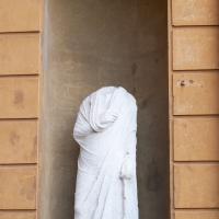 Togate Statue - View of a Headless Togate Statue in the Cortile Della Pigna in the Vatican Museum