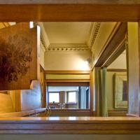 Frank Lloyd Wright Home and Studio - Interior: View from private study, through inglenook, into dining room