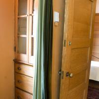 Frank Lloyd Wright Home and Studio - Interior: Master bedroom, door to bathroom