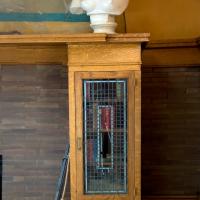 Frank Lloyd Wright Home and Studio - Interior: Playroom, viw of bust near fireplace