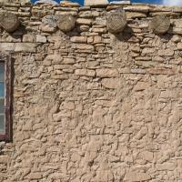 Acoma Pueblo  - Exterior: Adobe Brick House with Wooden Beam Roof 