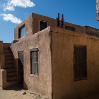Acoma Pueblo  - Exterior: Adobe Brick House with Staircase 