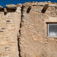 Acoma Pueblo  - Exterior: Adobe Brick Wall and Wooden Beam Roof 