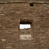 Chaco Canyon  - Chetro Ketl: Exterior Brick Wall with Windows, Looking Into  Complex 
