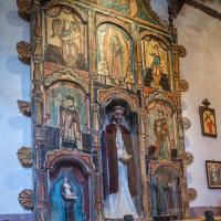 Santuario de Chimayo  - Interior: Reredos on North Wall of Nave 