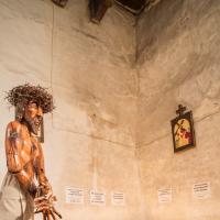 Santuario de Chimayo  - Interior: Votives and Statue of Christ 