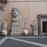 Capitoline Museums - Interior: Row of fragments from the colossal statue of Costantine along righthand wall of the courtyard