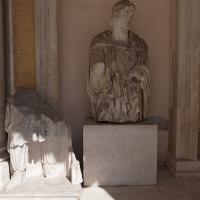 Capitoline Museum - View of fragment and sculpture from Arch of Constantine installed in front portico of Palazzo dei Conservatori courtyard 