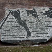 Baths of Caracalla - View of a fragment of a black and white mosaic with a striding figure