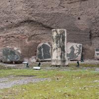 Baths of Caracalla - View of fragments of black and white mosaics with a broken column shaft
