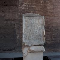 Colosseum - Detail: Fragment with inscription on display in the Colosseum
