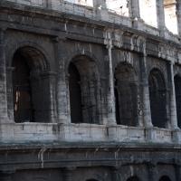 Colosseum - Exterior: View from ground of Ionic story columns and arches