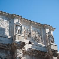 Arch of Constantine - View of Relief Panels from a monument to Marcus Aurelius depicting the Emperor talking to Troops and a Suovetaurilia with Flanking Dacians on top of Columns