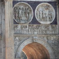 Arch of Constantine - View of Hadrianic Tondi on the North Face of the Arch depicting the Lion Hunt and a Sacrifice to Hercules with the Emperor distributing Money to the Poor in the Forum on the frieze below