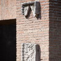 Palace of Domitian - View of a brick wall with relief fragments in the Palace of Domitian