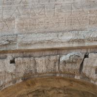 Porta Maggiore - View of the attic inscriptions of Porta Maggiore over an arch