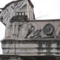 Arch of Septimius Severus - View of the carved ornaments on top of the Arch of Septimius Severus