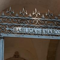 San Marco - Exterior: Detail of entrance gate inscription