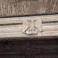 Santi Giovanni e Paolo - View of an eagle over the doorway of Santi Giovanni e Paolo