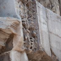 Arch of Titus - Detail: View of carved ornamentation under a relief panel on the Arch of Titus