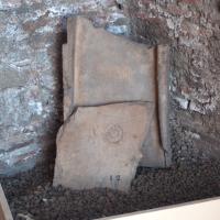 Trajan's Market - Interior: View of two terracotta fragments in Trajan's Market