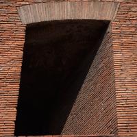 Trajan's Market - Interior: View of a wall of opus latericium with a Window in Trajan's Market