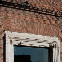 Trajan's Market - Exterior: View of an exterior brick window of Trajan's Market from the via Biberatica