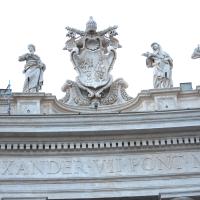 Saint Peter's Square - Exterior: Saints Theodora (by Jacomo Antonio Fancelli), Beatrice, Catherine of Siena (by Lazzaro Morelli) and Galla flanking Alexander VII's Coat of Arms on the South Colonnade of St. Peter's Square