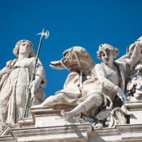 Saint Peter's Square - Exterior: View of a clock with sculpted figures in Saint Peter's Square