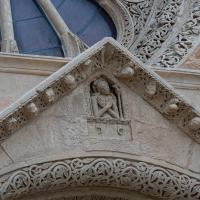 Basilica di Santa Caterina d'Alessandria - Exterior: Pediment with Relief of Jesus