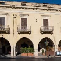 Palazzo dell'Arco Pretorio - Exterior: Arcade on Corso Vittorio Emanuele, Facing North