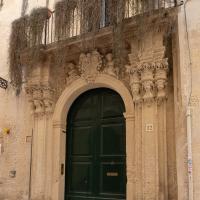 Palazzo Giustiniani - Exterior: Doorway on Via dei Perroni, Facing West