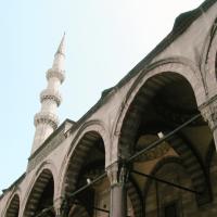 Suleymaniye Camii - Exterior: Mosque Main Entrance Portal; Inscription; Domed Bays; Covered Portico; Minaret; Facing South