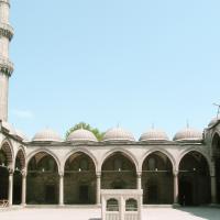 Suleymaniye Camii - Exterior: Complex Courtyard; Covered Portico; Domed Bays; Ablution Fountain (Sadirvan); Minaret; Southwest Side Entrance