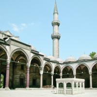 Suleymaniye Camii - Exterior: Mosque Complex Courtyard Facing Southwest; Main Entrance Portal to Left