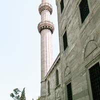 Suleymaniye Camii - Exterior: Northwest Facade of Complex facing West, Minaret, Iron-Grilled Windows