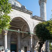 Atik Ali Pasha Camii - Exterior: Northwest Facade; Entrance; Minaret; Domed Portico