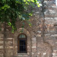 Eski Imaret Camii - Exterior: Western Facade Detail, Column Base, Spolia