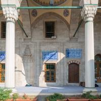 Sokullu Mehmed Pasha Camii - Exterior: Portico; Domed Bays; Main Entrance; Iron-Grilled Windows; Inscriptions; Blind Niche; Muqarnas