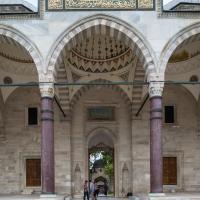Suleymaniye Camii - Exterior: Main Portal to Complex Courtyard Facing Northwest; Domed Portico; Prophyri Columns, Inscriptions