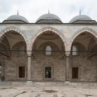 Suleymaniye Camii - Exterior: Complex Courtyard; Covered Portico; Domed Bays; Southwest Side Entrance 