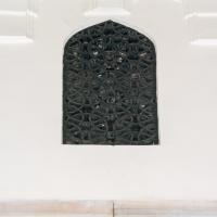 Suleymaniye Camii - Exterior: Northeastern Facade Detail, Above Main Entrance, Window Detail; Decorative Grill
