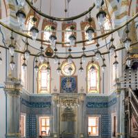 Beylerbeyi Camii - Interior: Central Prayer Hall, Facing Southeast Qibla Wall, Light Fixture, Quranic Inscription, Mihrab