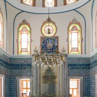 Beylerbeyi Camii - Interior: Central Prayer Hall, Facing Southeast Qibla Wall, Light Fixture, Quranic Inscription, Mihrab