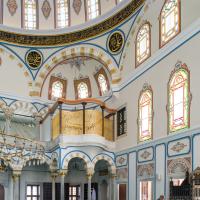 Beylerbeyi Camii - Interior: Central Prayer Hall, Facing North Corner Arcade, Ornamental Grill on Gallery Level, Pendentives with Calligraphic Inscription